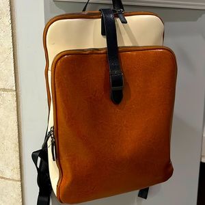 Gently used Leather work backpack. Brown, white, black. Had 1 year.